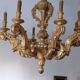 Large chandelier in gilded wood. Eight lights