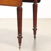 Antique mahogany coffee table with drawer and decorations, 19th century.
