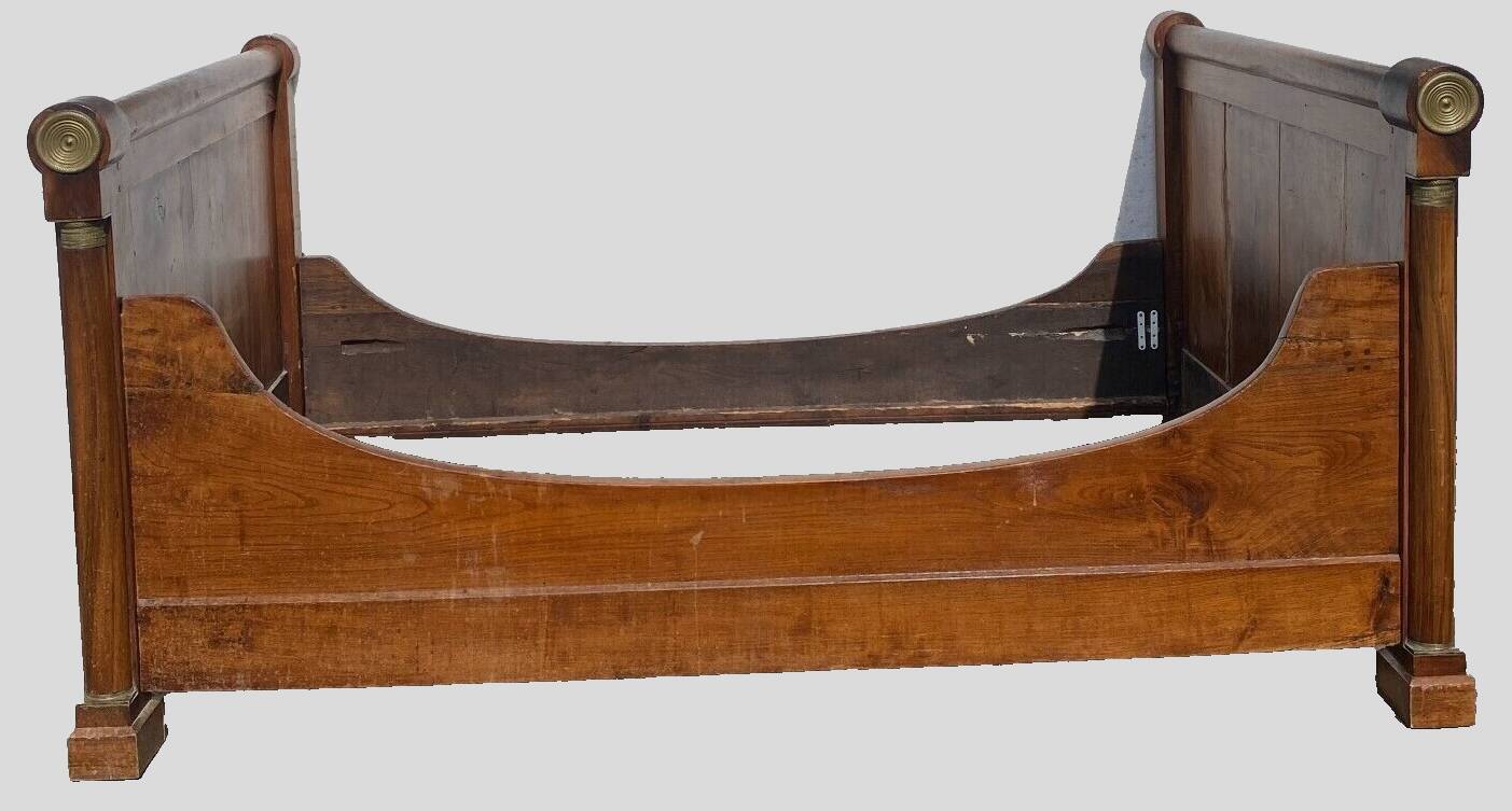 Empire period sleigh bed in solid walnut 19th century
