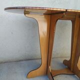 Oval table with formica flap