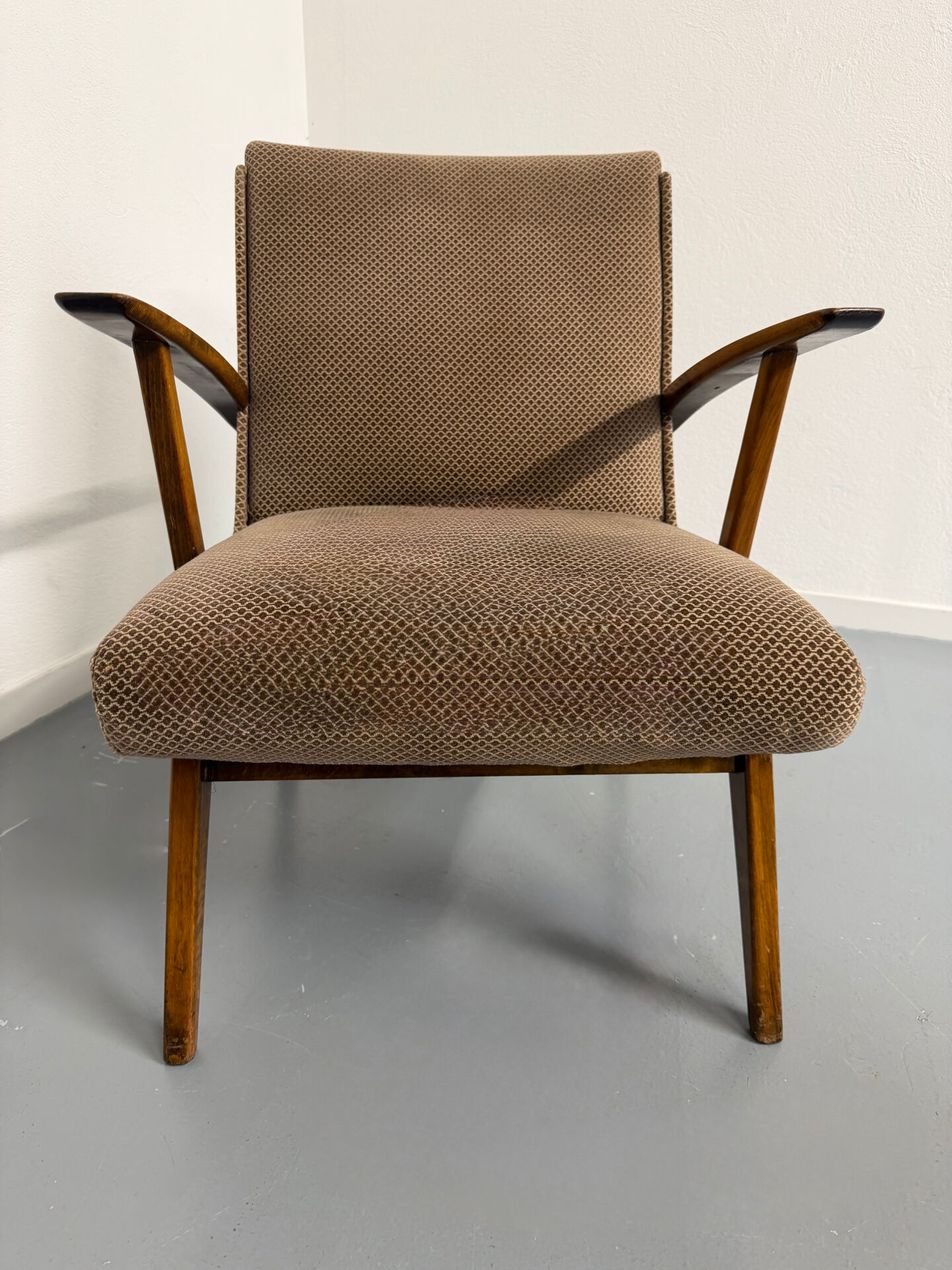 Set of 2 vintage wooden and fabric armchairs designed in the 1960s.