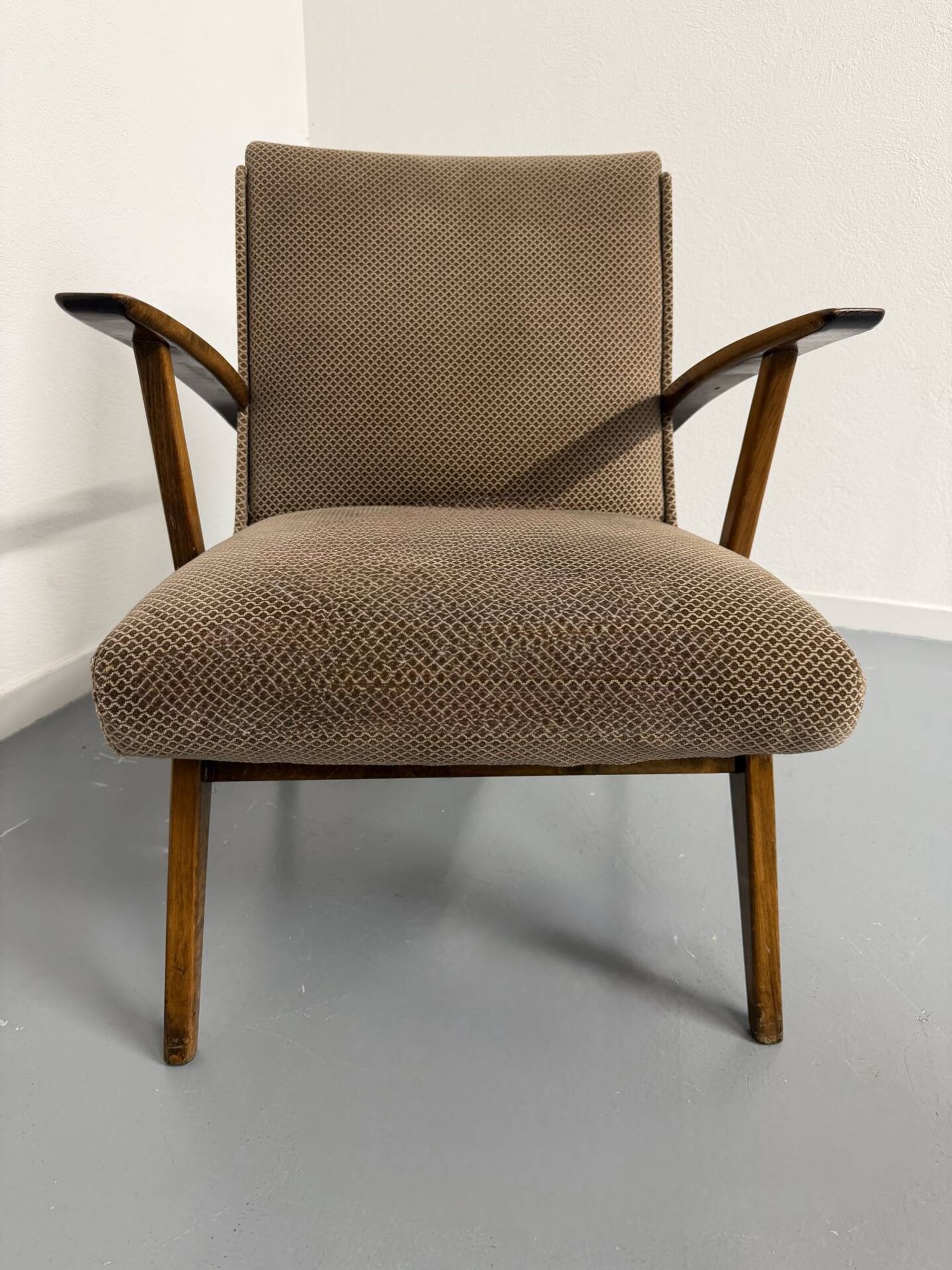 Set of 2 vintage wooden and fabric armchairs designed in the 1960s.
