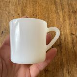 Espresso coffee cup service, Nestlé promotional items, in white glass.