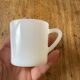 Espresso coffee cup service, Nestlé promotional items, in white glass.