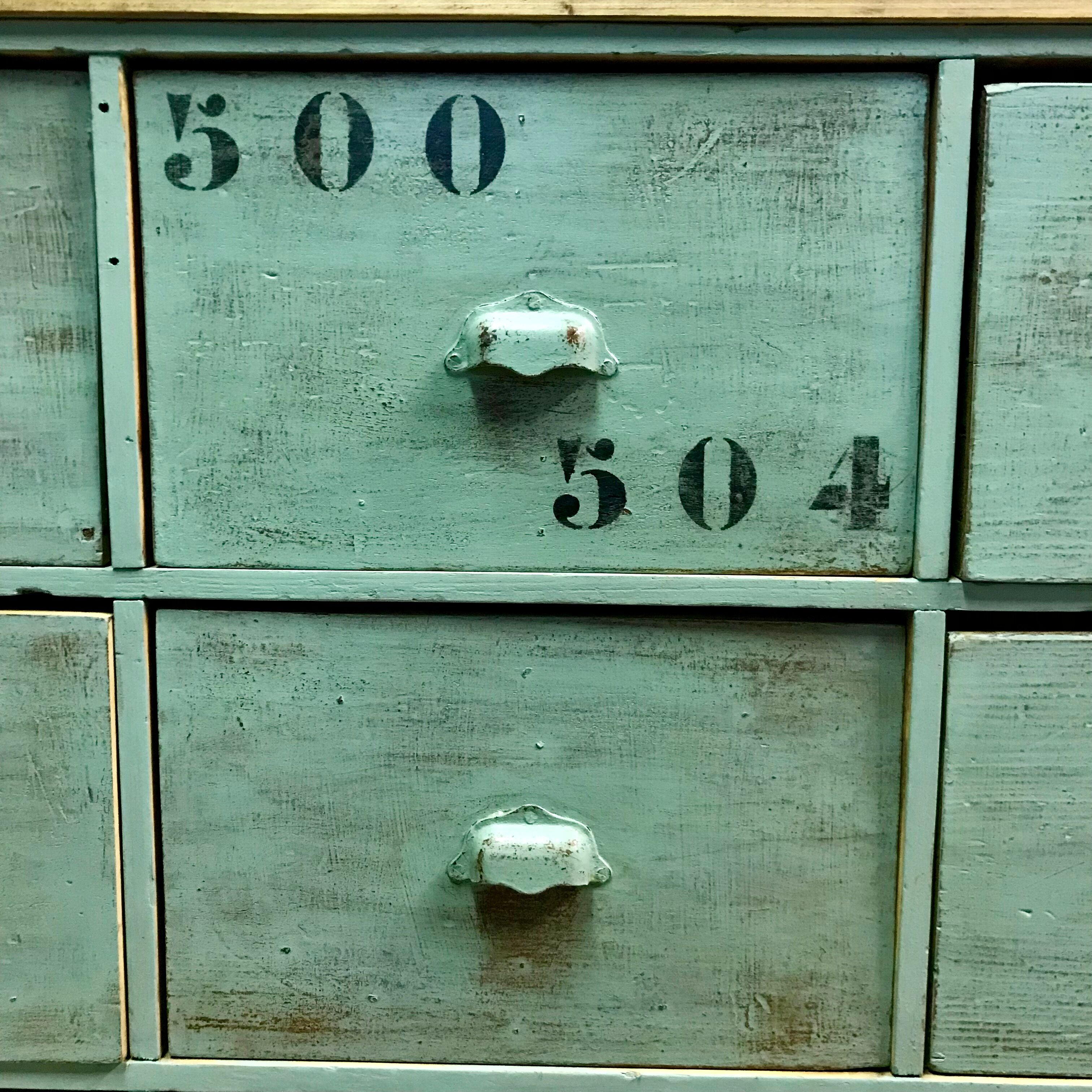 Furniture of metier enfilade with restored wooden drawers