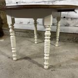Round walnut drop leaf table
