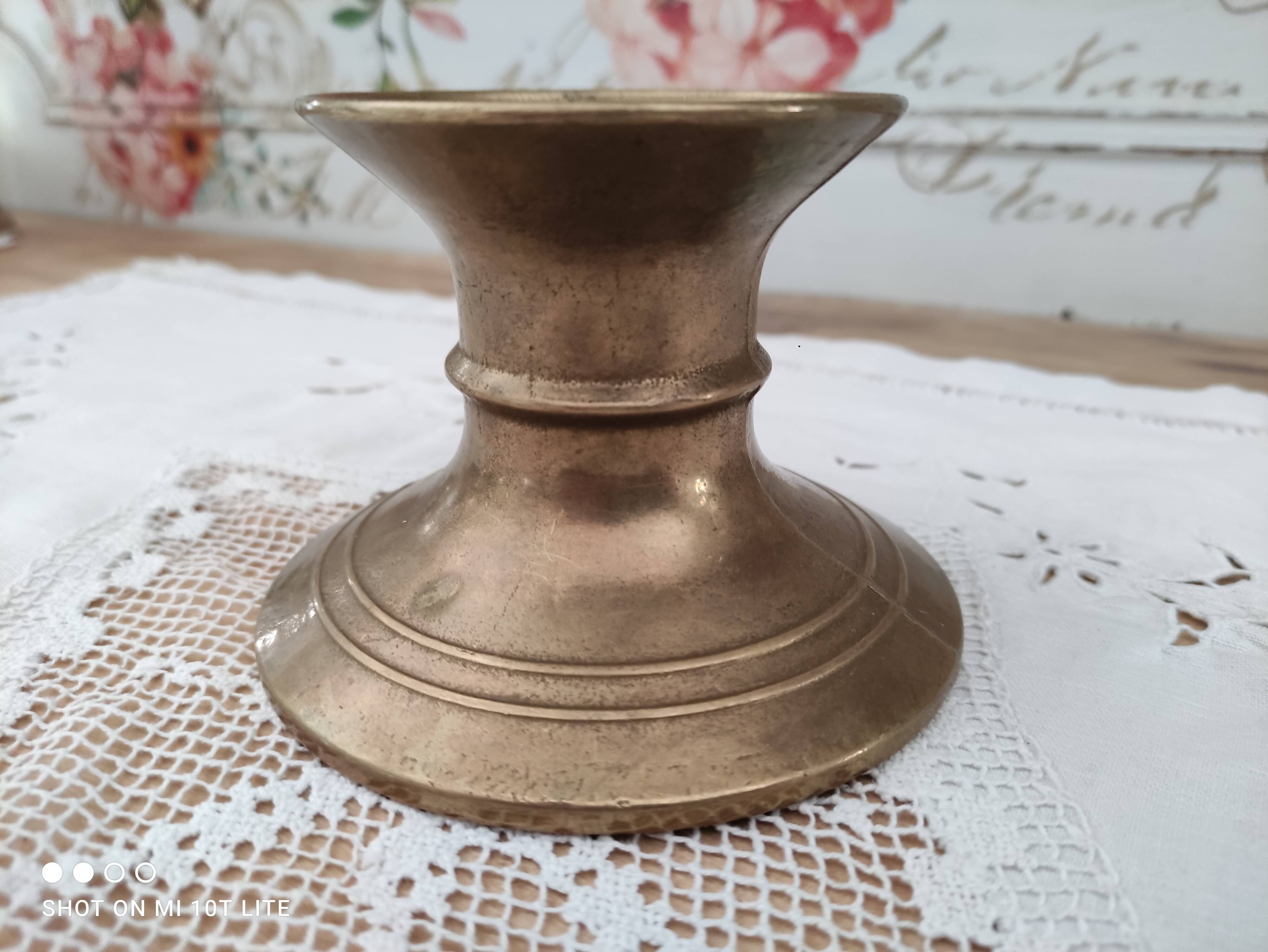 Low brass candle holder