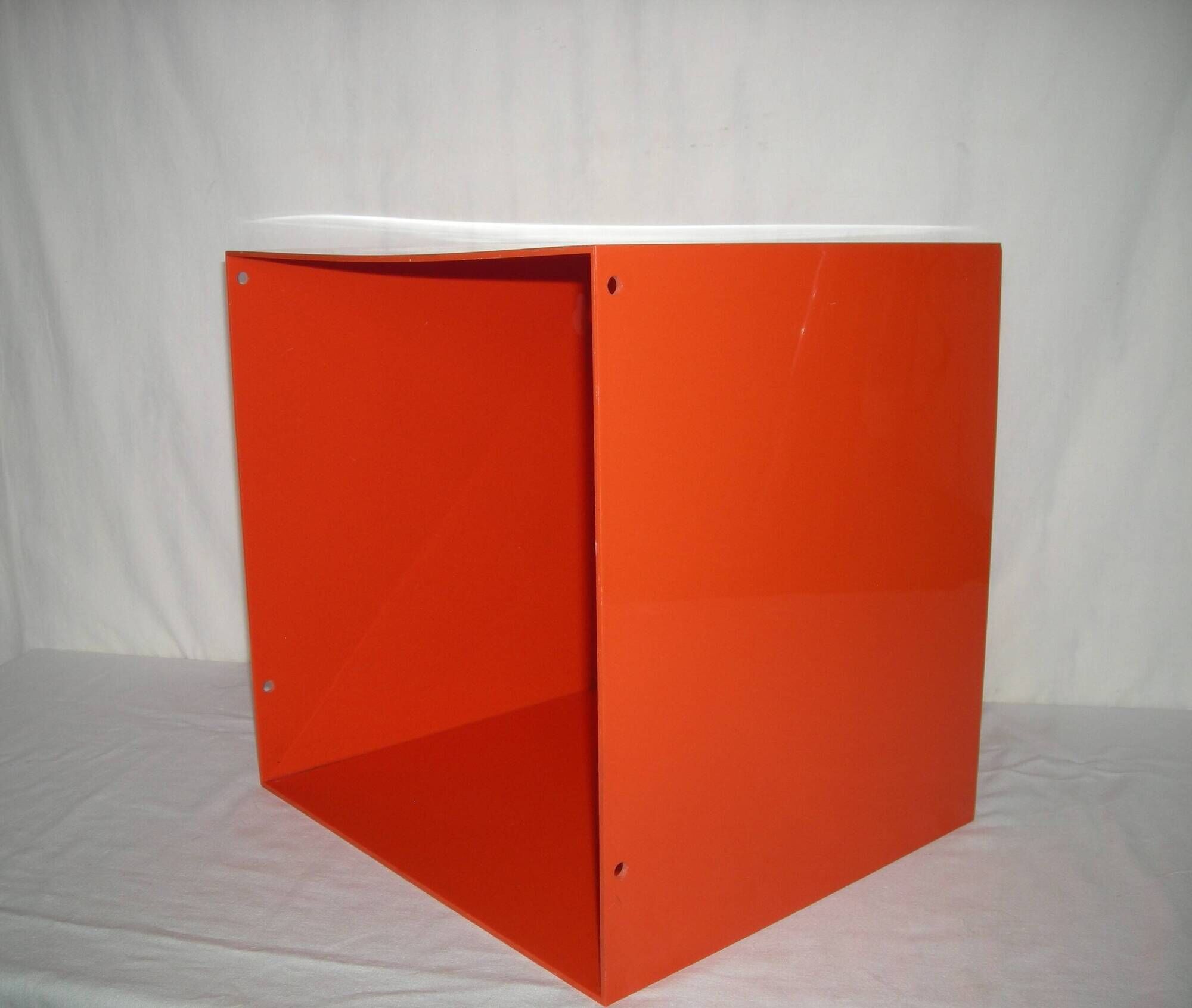 Orange cubic shelf from the 1970s.