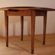 Round table in raw wood