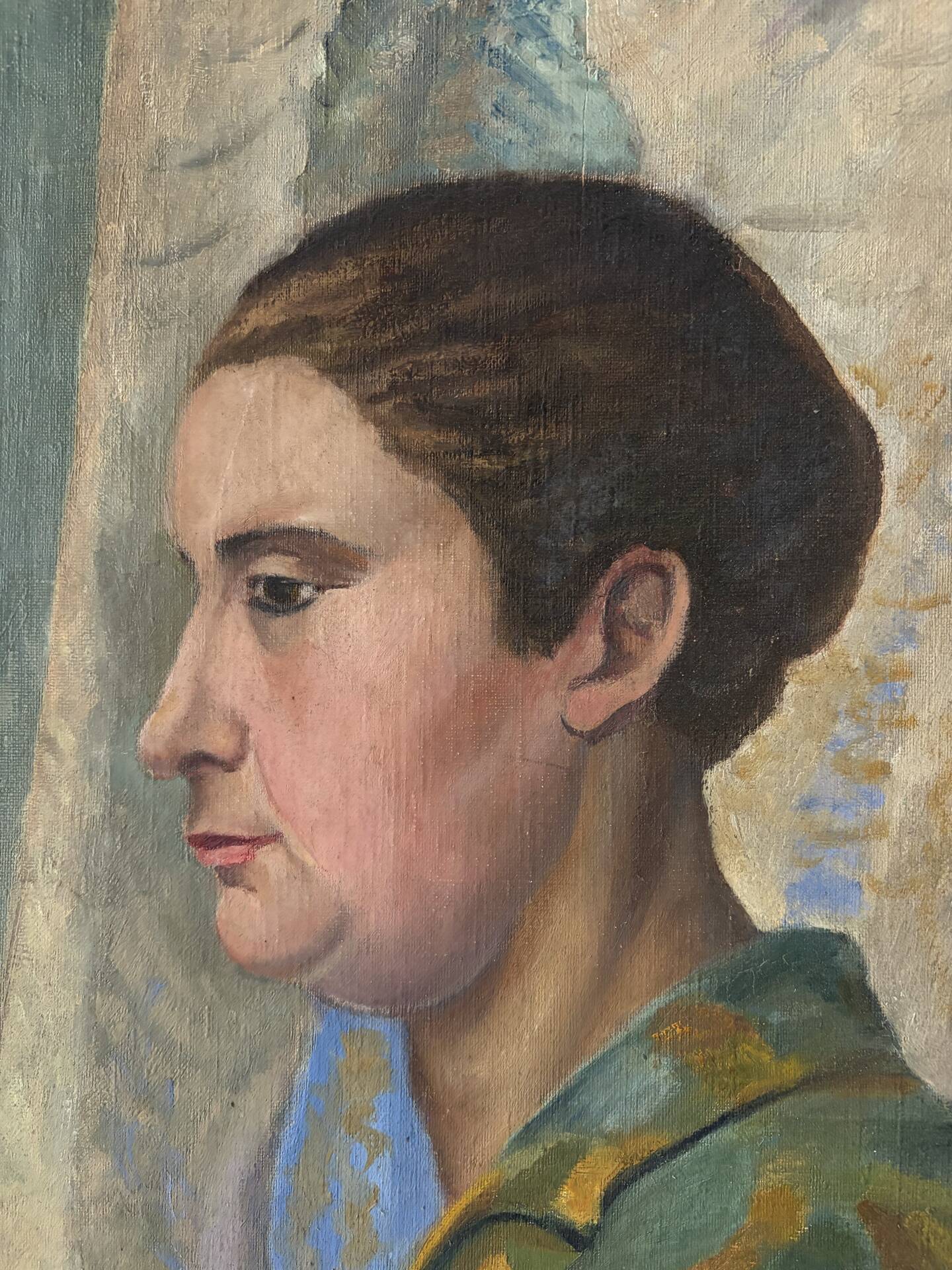 Profile of a woman, oil on canvas signed Henry Portal.
