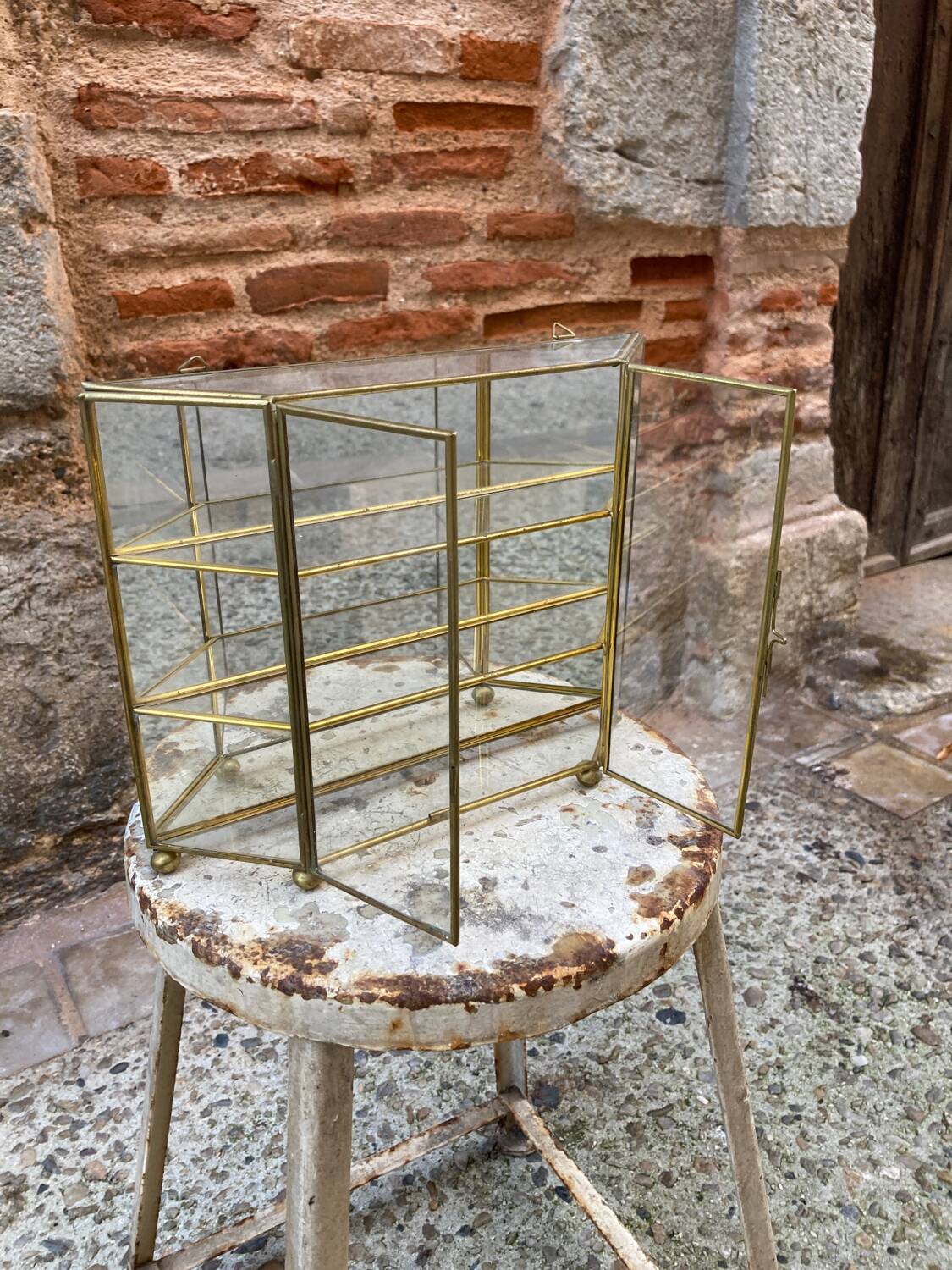 Brass wall display case