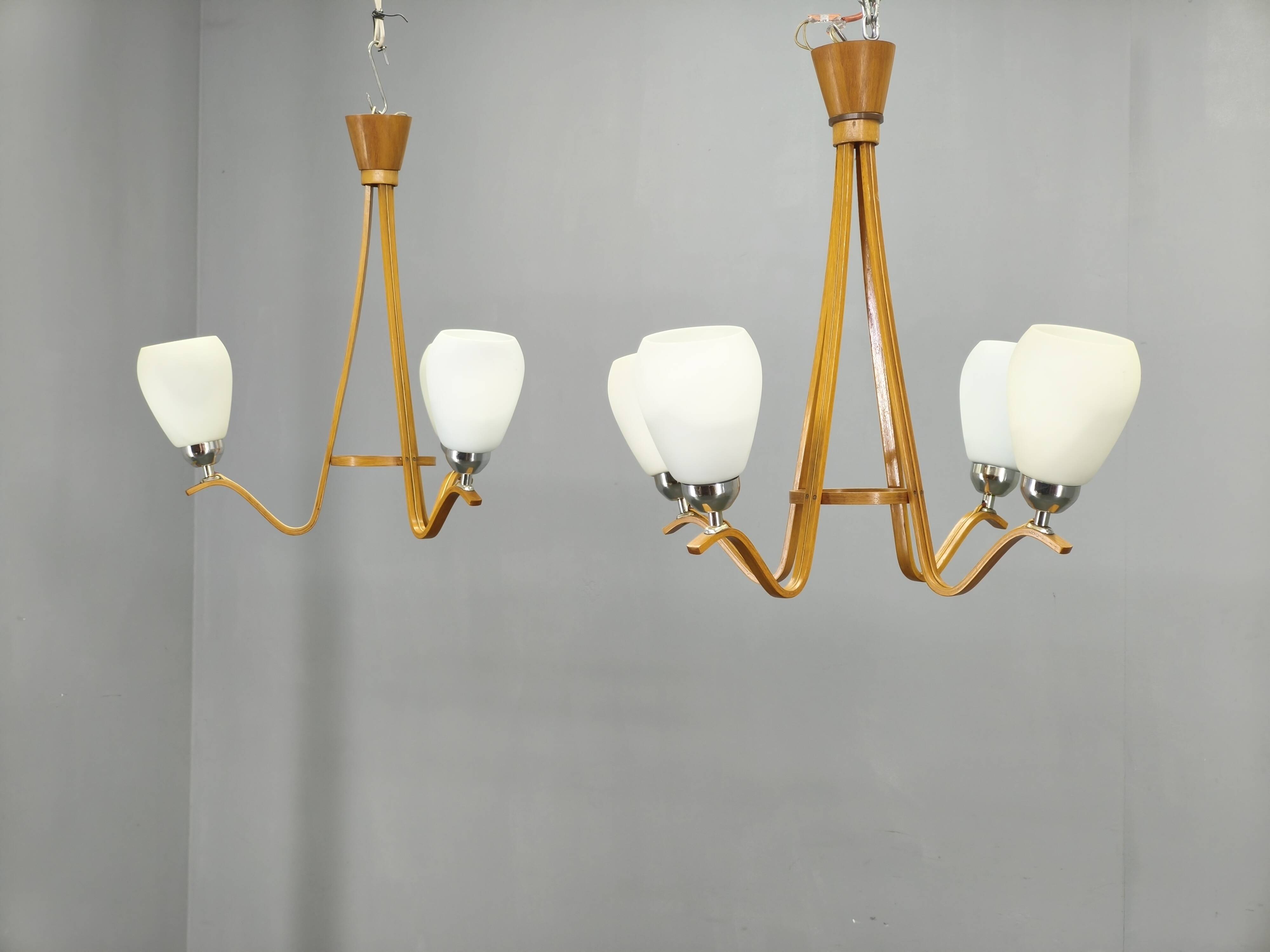 Pair of Czech Mid-Century Wood and Glass Chandeliers by Dřevo Humpolec