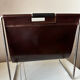 Leather and chrome magazine rack Brabantia