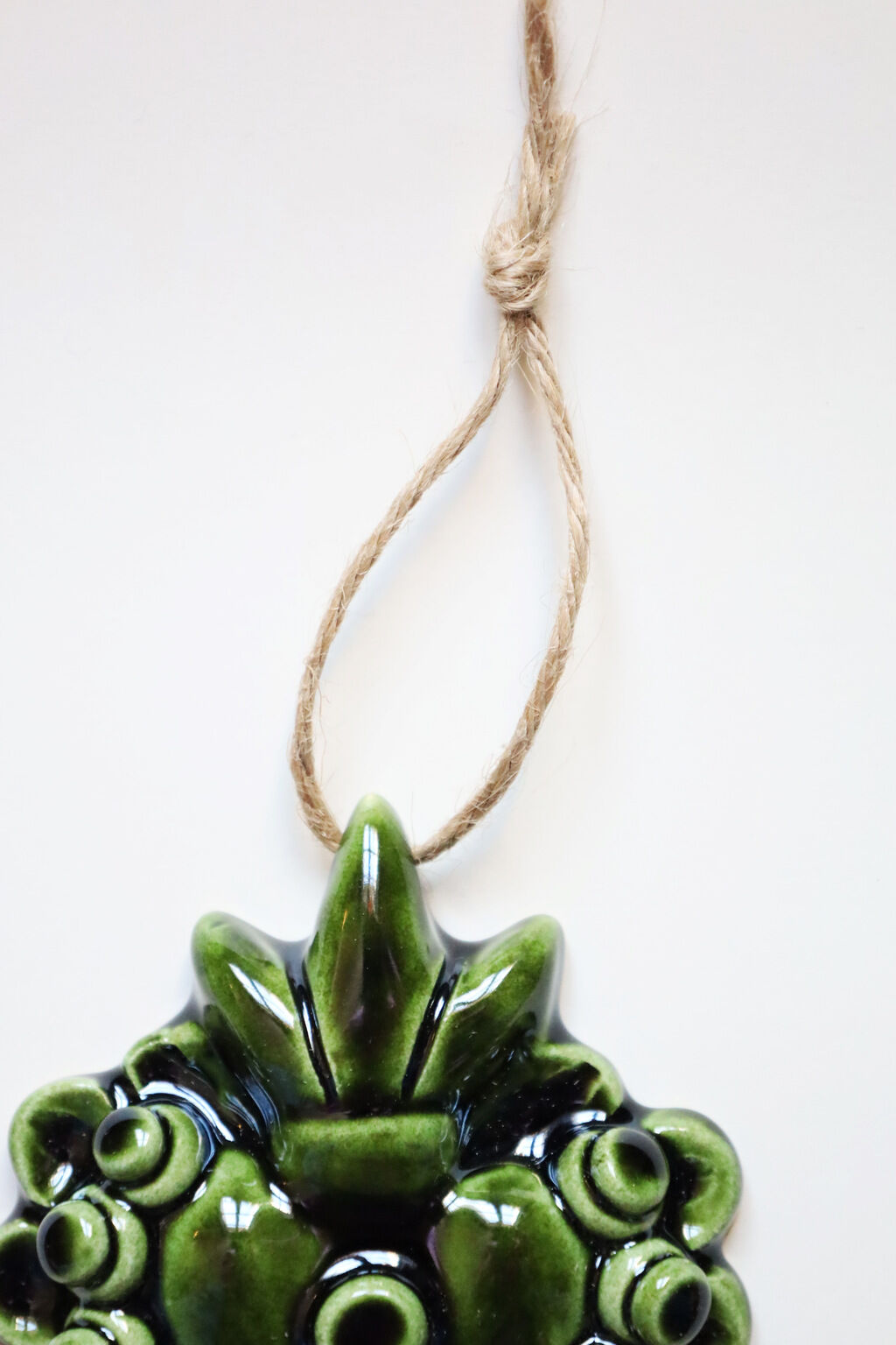 Decorative heart in green ceramic "pearls"