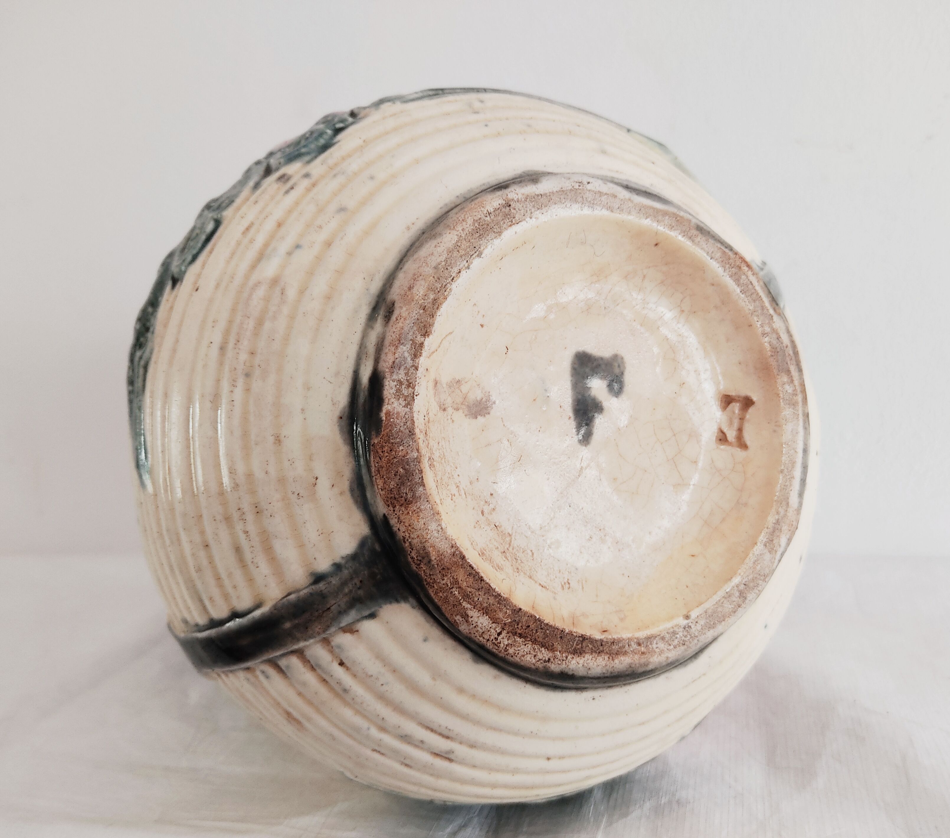 Pitcher dabbling around 1900