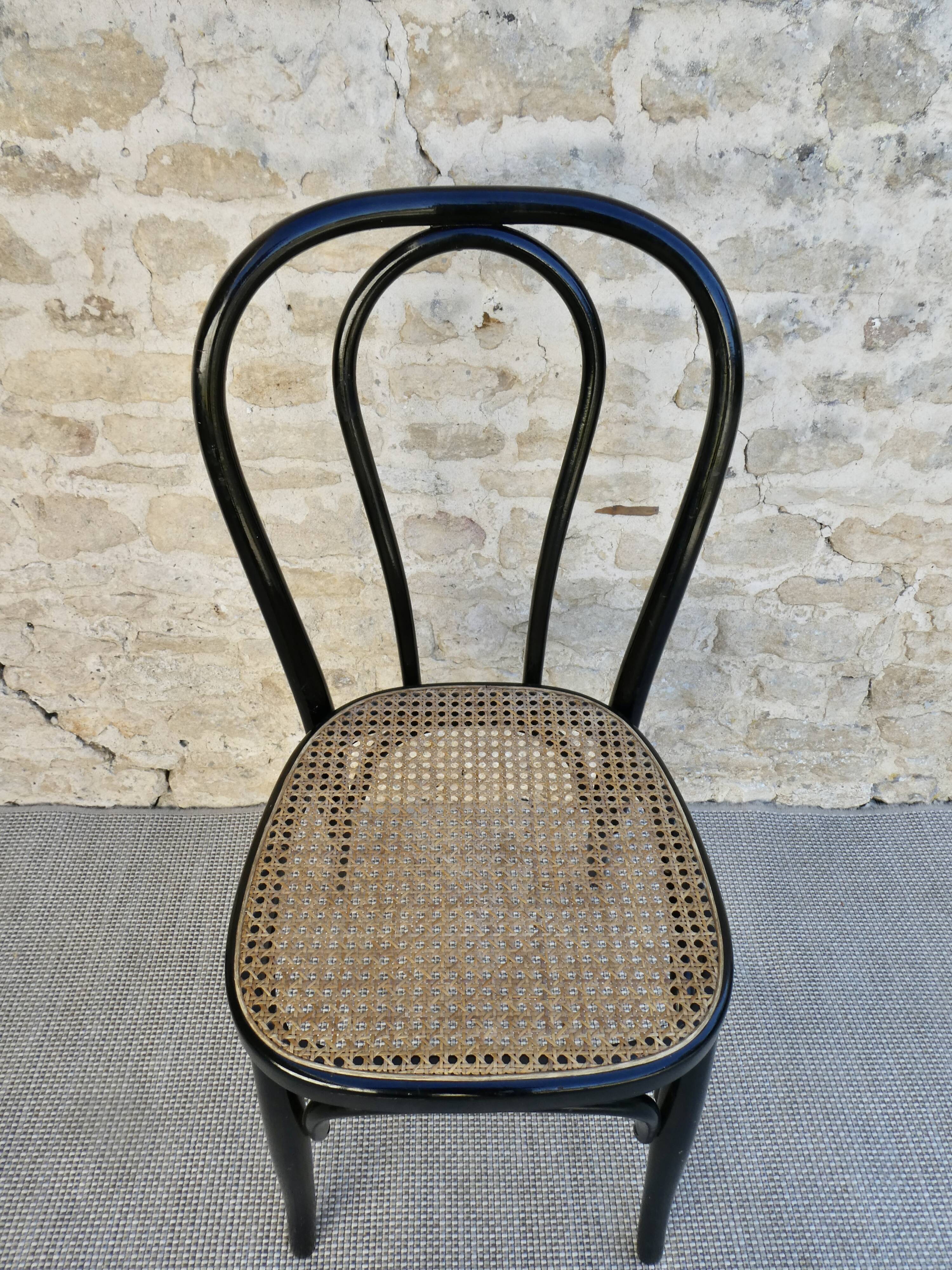 Bistro chair in black lacquered wood and seat in cannage