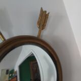 Curved brass witch's mirror