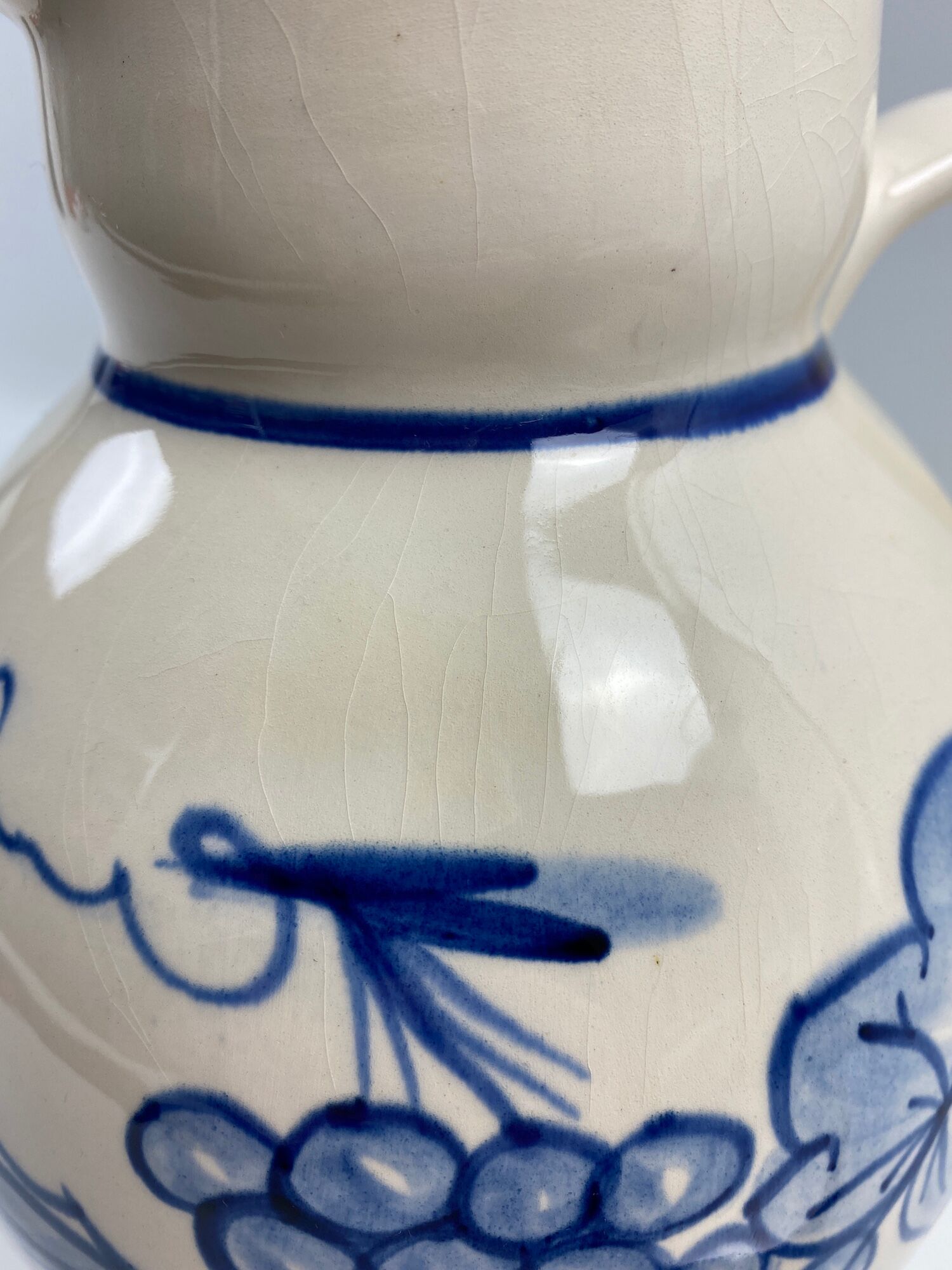 Ceramic pitcher decorated grapes
