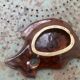 Empty pocket in glazed ceramic slip in the shape of vintage fish