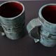 A pair of modernist mugs by L.Y Bonnet.