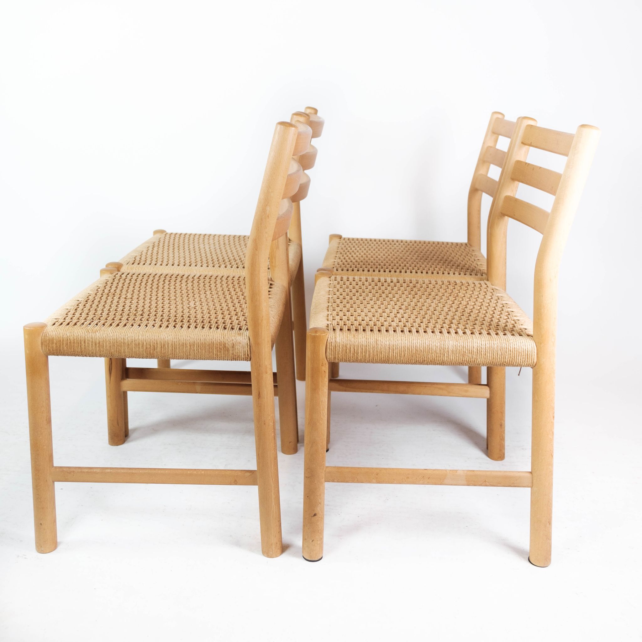 A set of four Kurt Østervig oak dining chairs for K.P. Møbler