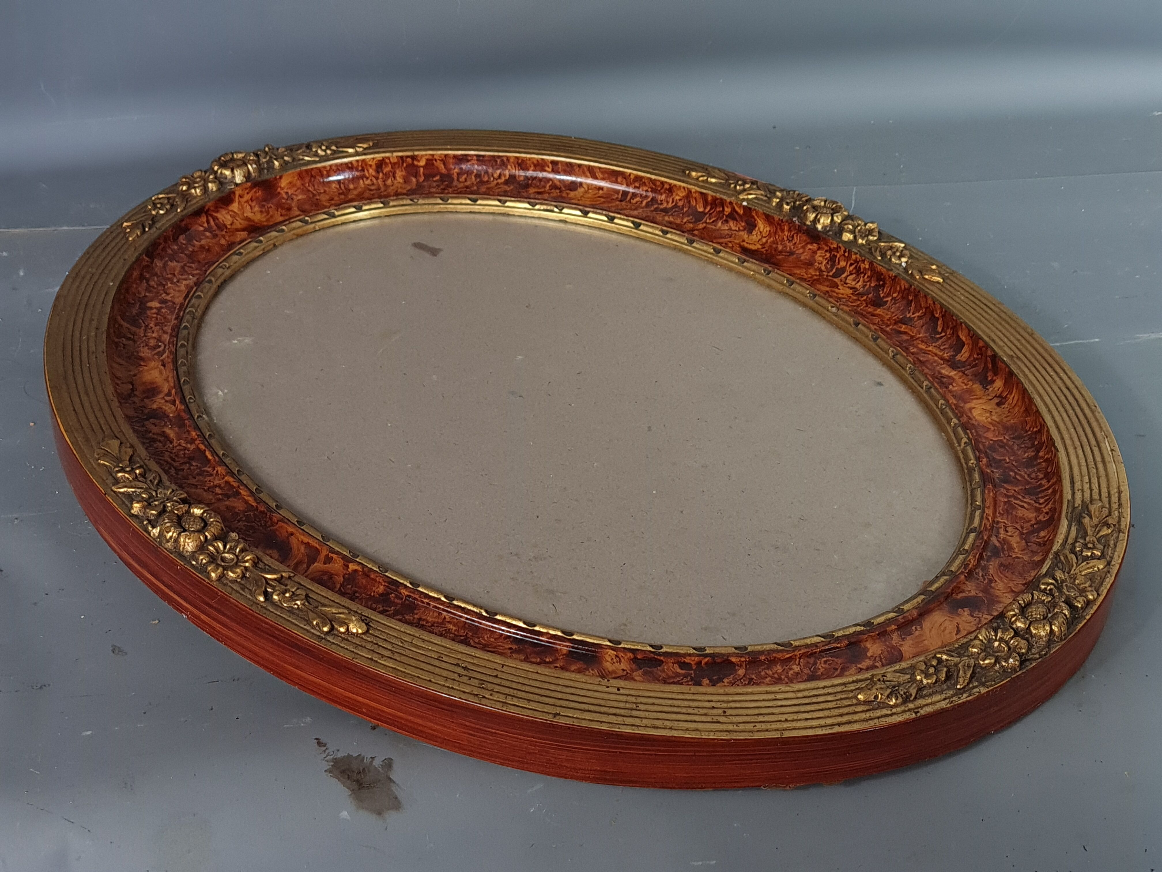 Old oval frame gilded stucco wood