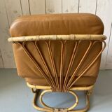 Pair of leather and bamboo armchairs