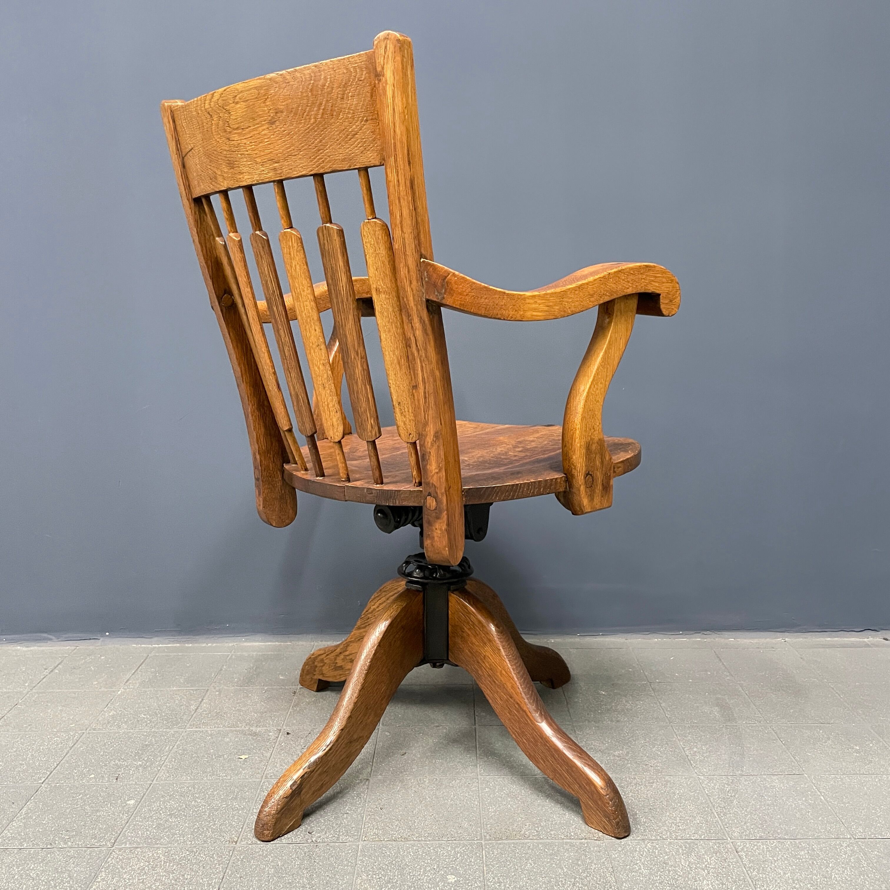 Antique American oak office chair with armrests 1920s