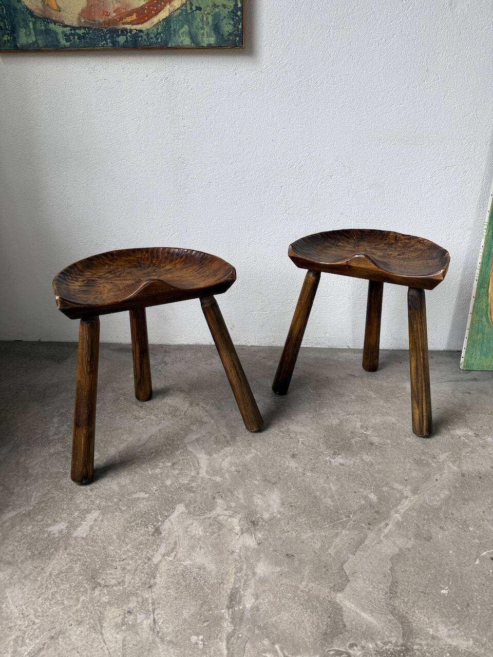 Pair of Le Selou tripod shepherd's stools