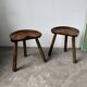 Pair of Le Selou tripod shepherd's stools