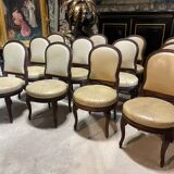 Suite of 12 Louis XVI style chairs model of Georges Jacob with Console Late nineteenth