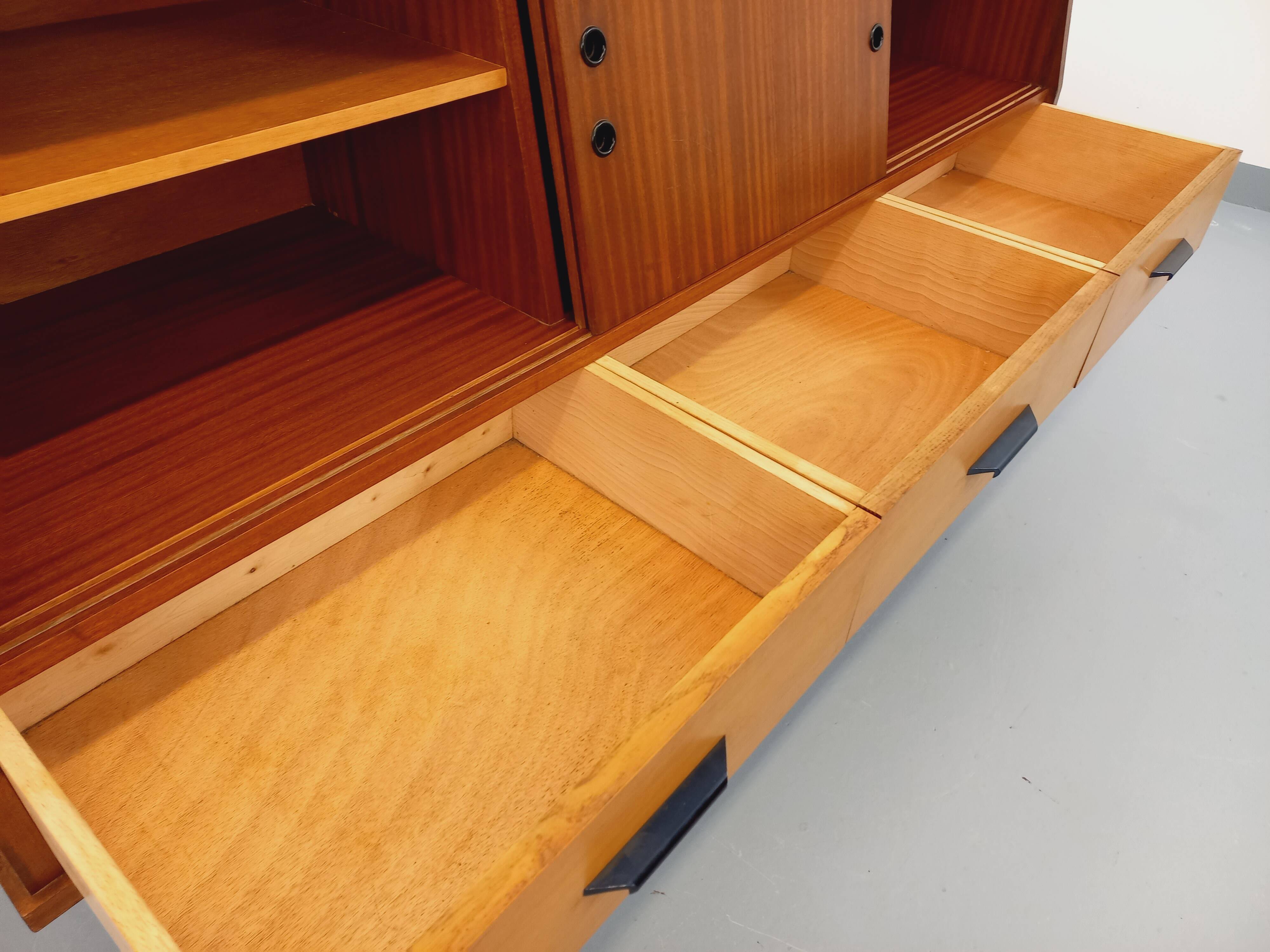 Vintage wooden enfilade in teak style from the 1960s.