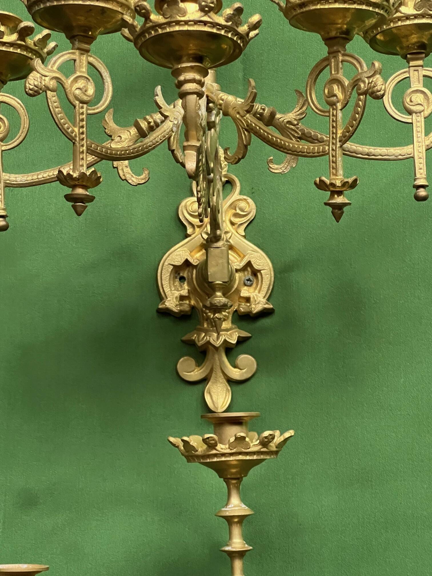 Pair of neo-Gothic wall sconces. Solid gilt bronze.