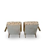 Ensemble de fauteuils Art Déco avec accoudoirs en hêtre arqués.