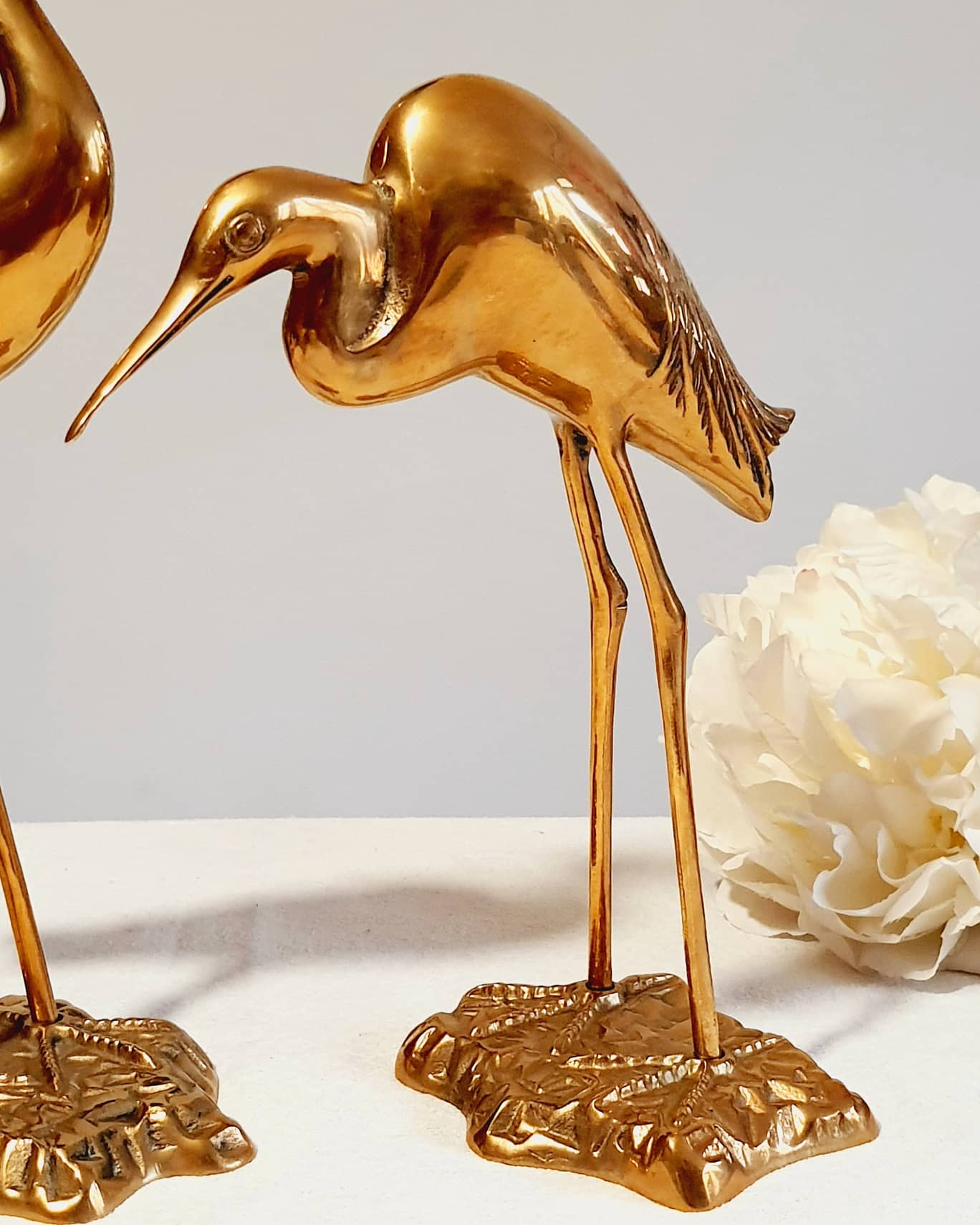 Couple of heron in vintage golden brass