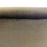 Vintage green two-seater sofa with fringes