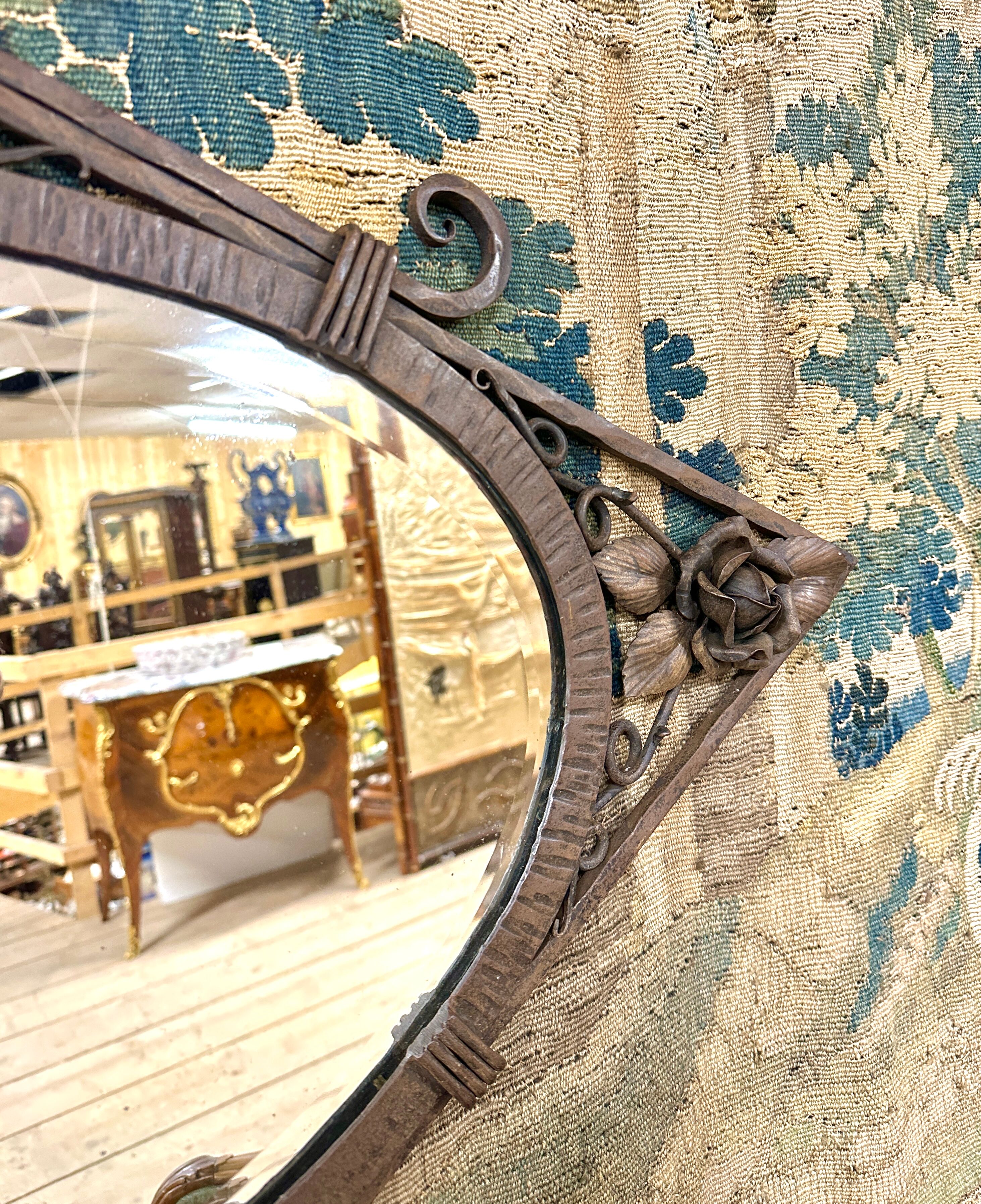 Diamond wall mirror of the art deco period in wrought iron, circa 1920