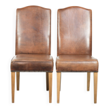 Set of 2 characterful dining chairs of sheepskin leather with a high back