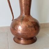Old italian amphora vase in hammered copper