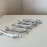 Set of 5 white porcelain knife holders, pantheon fox dogs