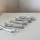 Ensemble de 5 portes couteaux porcelaine blanche chiens renards panthè