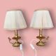 Pair of bedside or side fish lamps in gilded brass