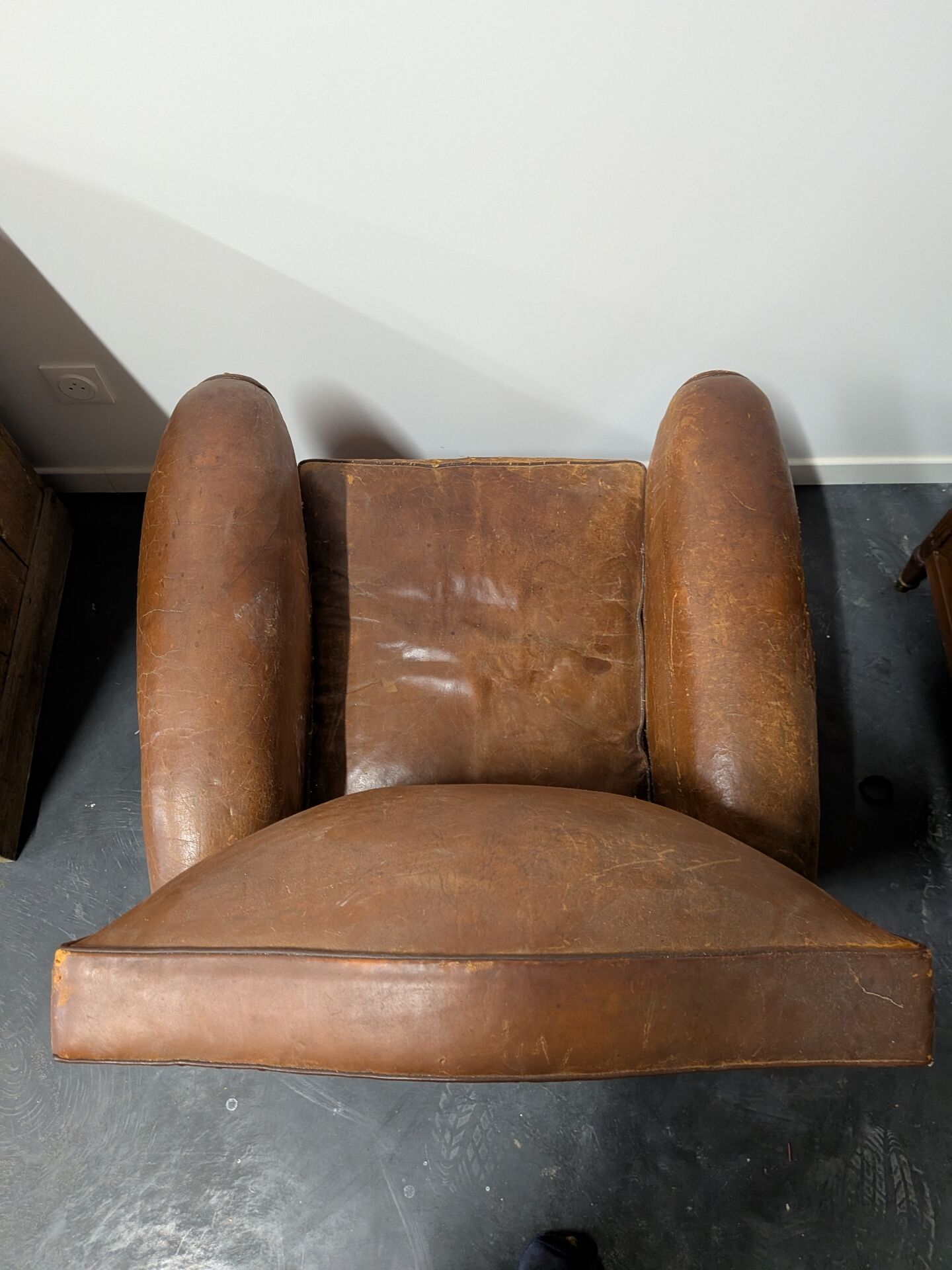 Pair of moustache club armchairs in leather, France, 1930s — to be restored.