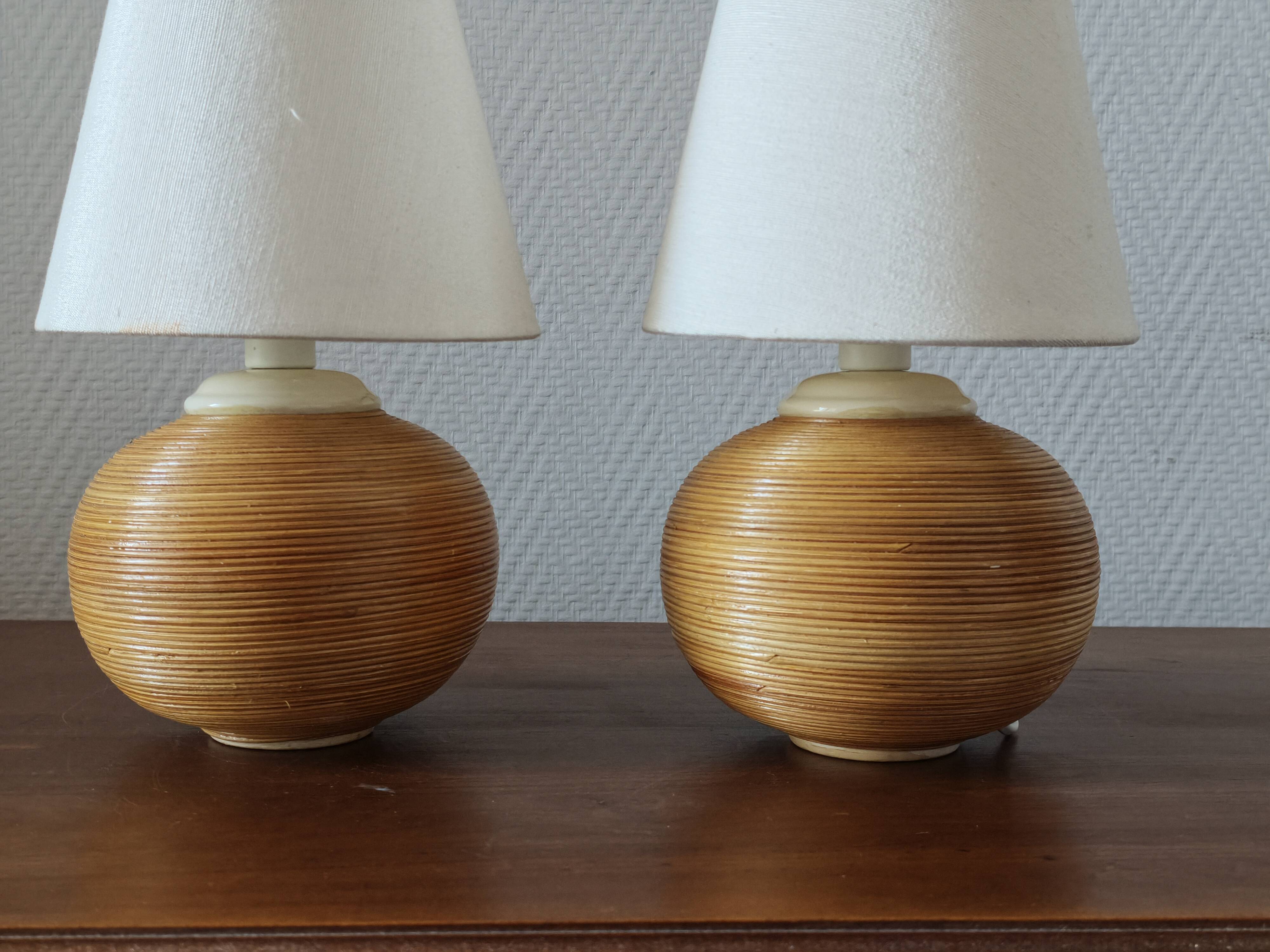 Pair of vintage lamps in rattan and ceramic