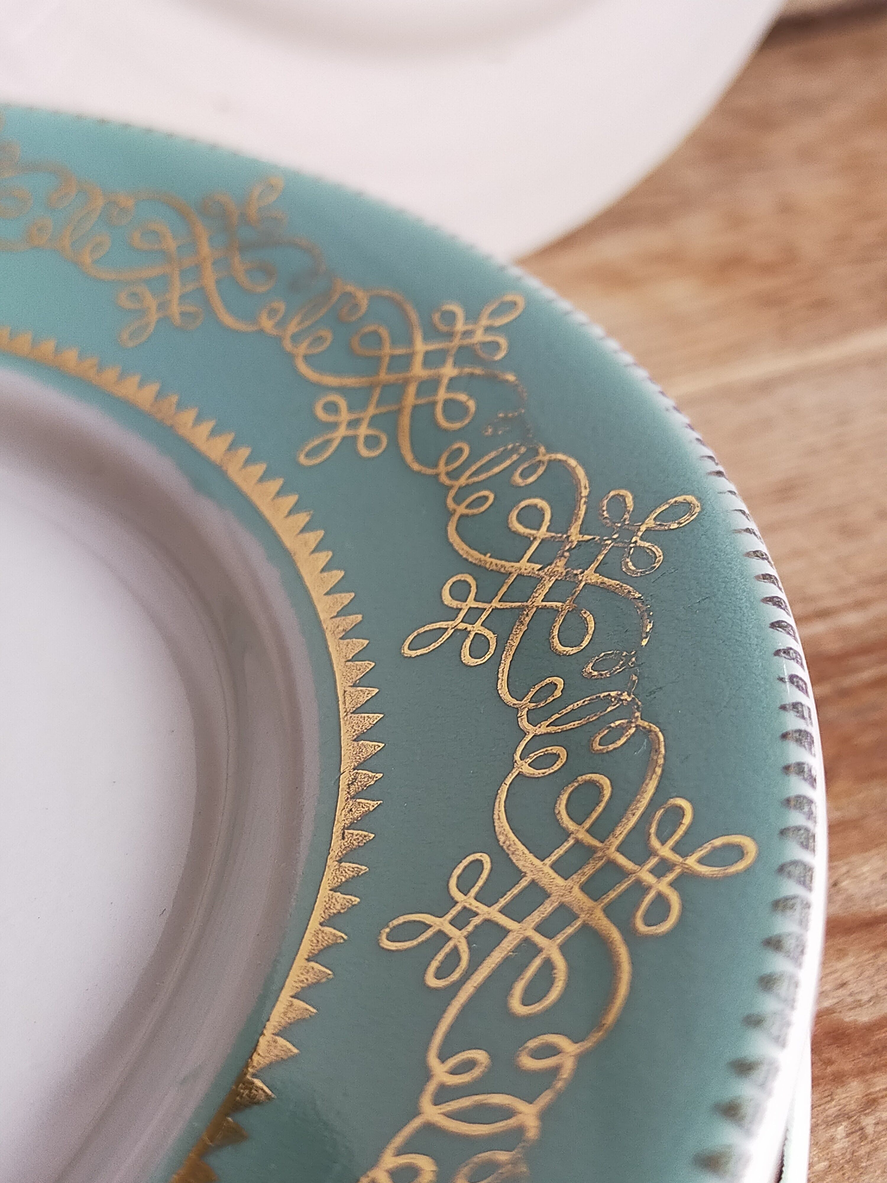 Six plates of vintage Badonviller earthenware with gold frieze