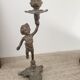 Pewter gray cherub candle holder.