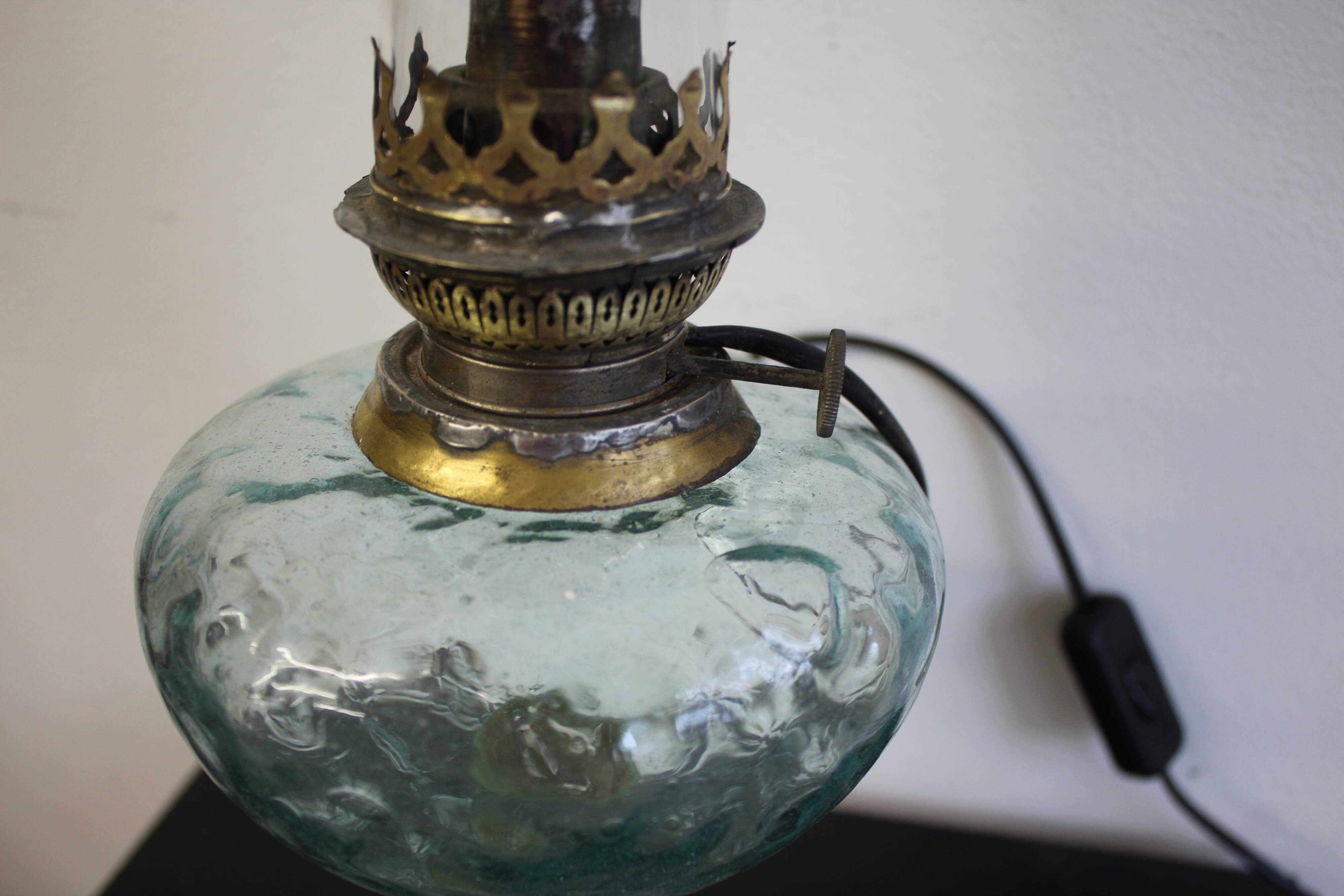 Oil lamp transformed into a bedside lamp