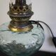 Oil lamp transformed into a bedside lamp