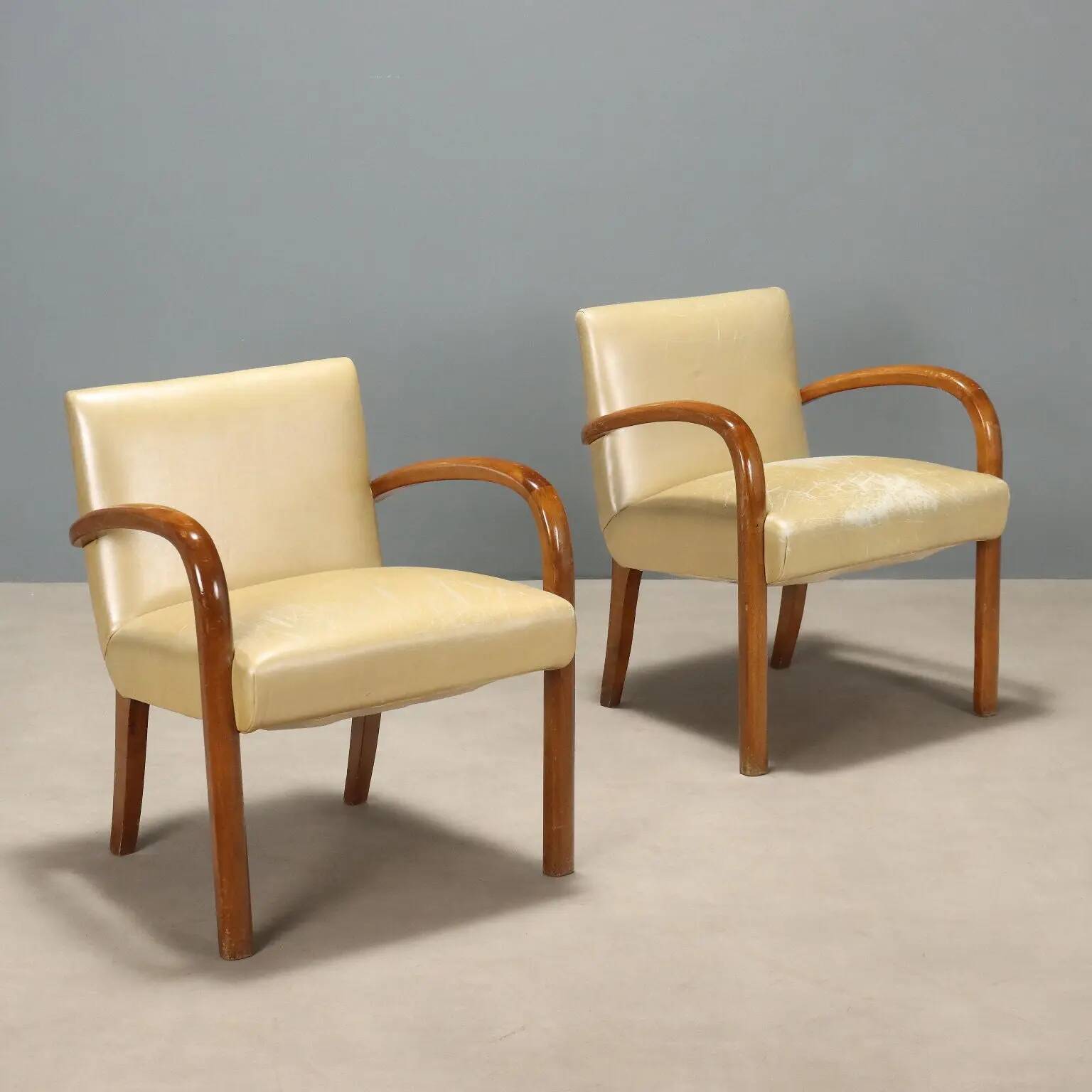 Pair of vintage armchairs in beech and faux leather, Italian design, 1960s.
