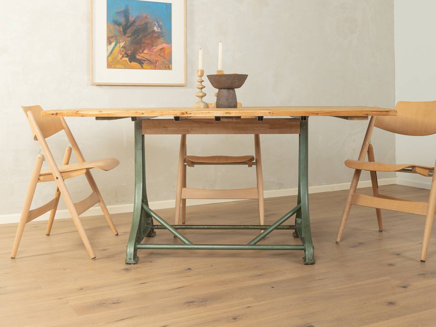 Unique dining table with cast iron base and solid wood top